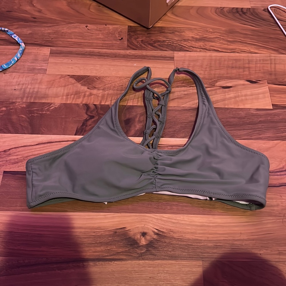 Green swimsuit top